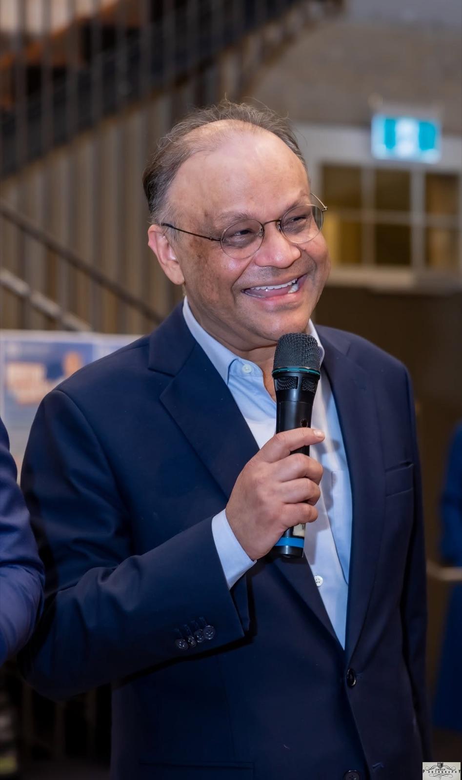 A member addressing the room at the Artha Business Roundtable and meet-and-greet.